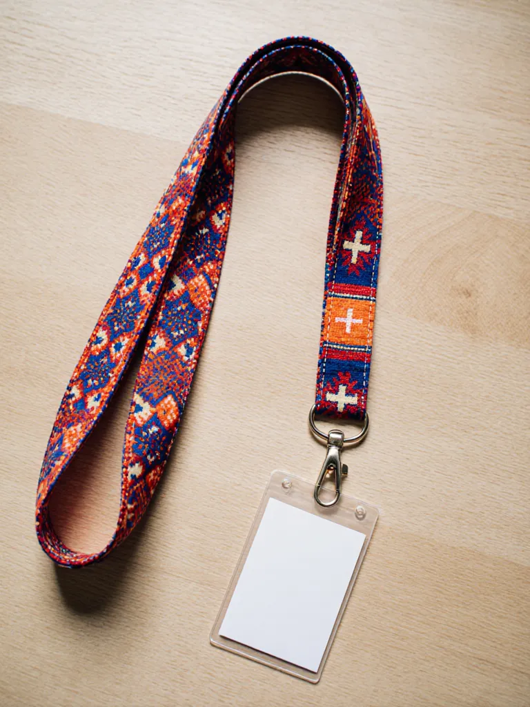 Lanyard in brown and green traditional Nepali Dhaka fabric